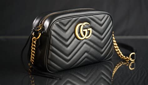 how to tell if a gucci pouch is real|gucci purse real.